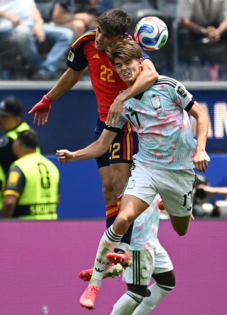 (260711) -- LOS ANGELES, July 11, 2026 (Xinhua) -- Pau Cubarsi (L) of Spain jumps for a header against Charles De Ketelaere of Belgium during the quarter final match between Spain and Belgium at the 2026 FIFA World Cup at Los Angeles Stadium in Los Angeles, the United States, July 10, 2026. (Xinhua/Wu Xiaoling)