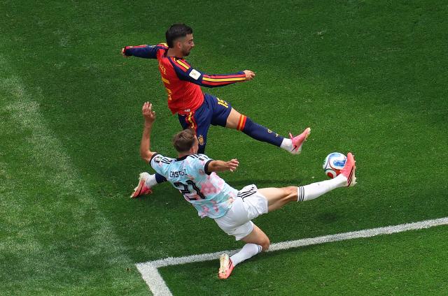 (260711) -- LOS ANGELES, July 11, 2026 (Xinhua) -- Alex Baena (up) of Spain vies with Timothy Castagne of Belgium during the quarter final match between Spain and Belgium at the 2026 FIFA World Cup at Los Angeles Stadium in Los Angeles, the United States, July 10, 2026. (Xinhua/Mao Siqian)
