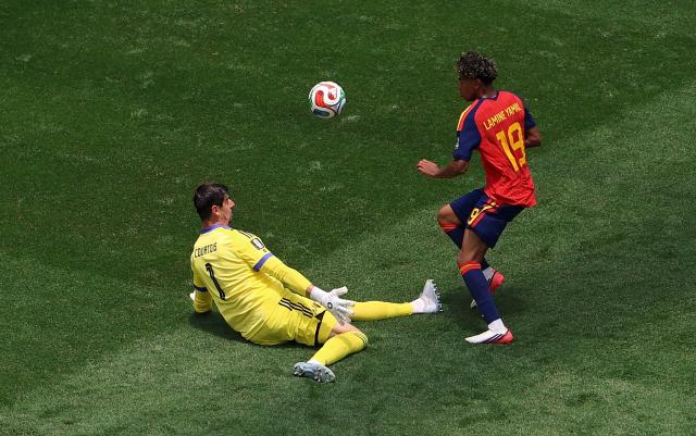 (260711) -- LOS ANGELES, July 11, 2026 (Xinhua) -- Thibaut Courtois (L), goalkeeper of Belgium makes a save during the quarter final match between Spain and Belgium at the 2026 FIFA World Cup at Los Angeles Stadium in Los Angeles, the United States, July 10, 2026. (Xinhua/Mao Siqian)