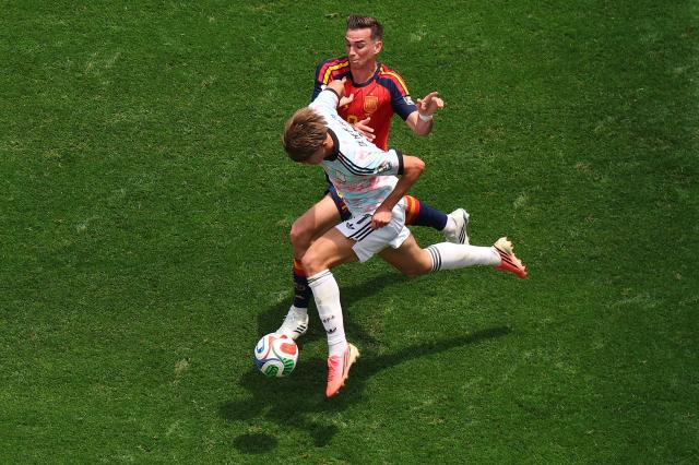 (260711) -- LOS ANGELES, July 11, 2026 (Xinhua) -- Charles De Ketelaere (front) of Belgium vies with Fabian Ruiz of Spain during the quarter final match between Spain and Belgium at the 2026 FIFA World Cup at Los Angeles Stadium in Los Angeles, the United States, July 10, 2026. (Xinhua/Mao Siqian)