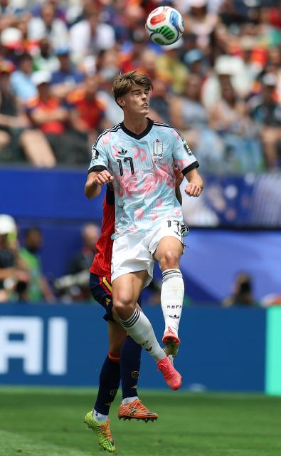 (260711) -- LOS ANGELES, July 11, 2026 (Xinhua) -- Charles De Ketelaere (up) of Belgium jumps for a header during the quarter final match between Spain and Belgium at the 2026 FIFA World Cup at Los Angeles Stadium in Los Angeles, the United States, July 10, 2026. (Xinhua/Bai Xuefei)