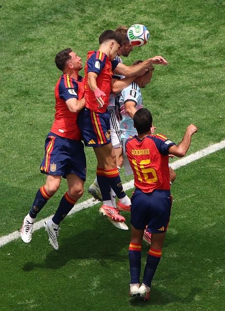 (260711) -- LOS ANGELES, July 11, 2026 (Xinhua) -- Players of both sides jump for a header during the quarter final match between Spain and Belgium at the 2026 FIFA World Cup at Los Angeles Stadium in Los Angeles, the United States, July 10, 2026. (Xinhua/Mao Siqian)