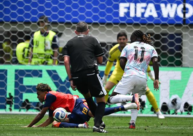 (260711) -- LOS ANGELES, July 11, 2026 (Xinhua) -- Lamine Yamal (L) of Spain is fouled by Jeremy Doku (R) of Belgium during the quarter final match between Spain and Belgium at the 2026 FIFA World Cup at Los Angeles Stadium in Los Angeles, the United States, July 10, 2026. (Xinhua/Wu Xiaoling)