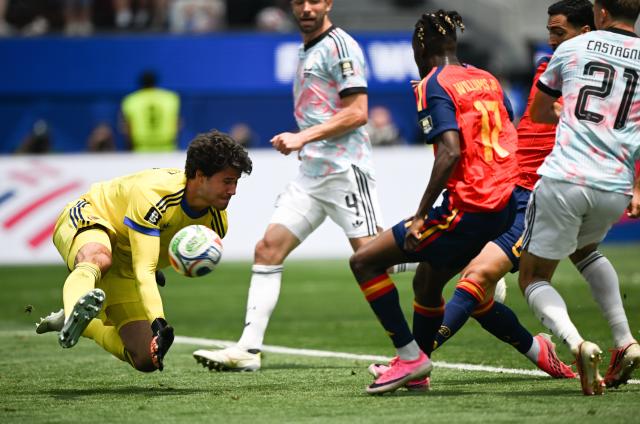 (260711) -- LOS ANGELES, July 11, 2026 (Xinhua) -- Mikel Merino (2nd R) of Spain shoots to score during the quarter final match between Spain and Belgium at the 2026 FIFA World Cup at Los Angeles Stadium in Los Angeles, the United States, July 10, 2026. (Xinhua/Wu Xiaoling)