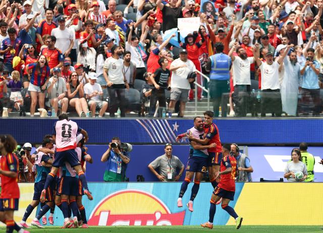 (260711) -- LOS ANGELES, July 11, 2026 (Xinhua) -- Players of Spain celebrate scoring during the quarter final match between Spain and Belgium at the 2026 FIFA World Cup at Los Angeles Stadium in Los Angeles, the United States, July 10, 2026. (Xinhua/Bai Xuefei)