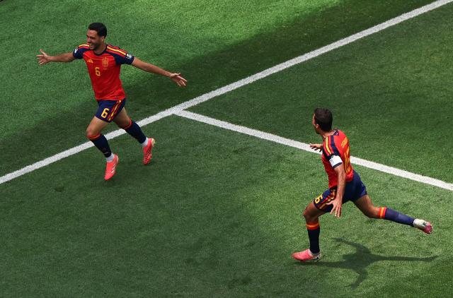 (260711) -- LOS ANGELES, July 11, 2026 (Xinhua) -- Mikel Merino (L) of Spain celebrates scoring during the quarter final match between Spain and Belgium at the 2026 FIFA World Cup at Los Angeles Stadium in Los Angeles, the United States, July 10, 2026. (Xinhua/Mao Siqian)