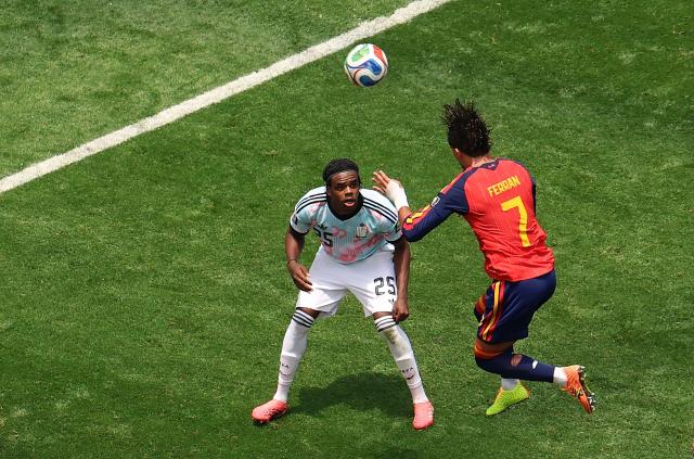(260711) -- LOS ANGELES, July 11, 2026 (Xinhua) -- Ferran Torres (R) of Spain jumps for a header during the quarter final match between Spain and Belgium at the 2026 FIFA World Cup at Los Angeles Stadium in Los Angeles, the United States, July 10, 2026. (Xinhua/Mao Siqian)