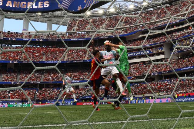 (260711) -- LOS ANGELES, July 11, 2026 (Xinhua) -- Unai Simon (1st R), goalkeeper of Spain makes a save during the quarter final match between Spain and Belgium at the 2026 FIFA World Cup at Los Angeles Stadium in Los Angeles, the United States, July 10, 2026. (Xinhua/Bai Xuefei)