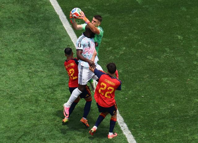 (260711) -- LOS ANGELES, July 11, 2026 (Xinhua) -- Unai Simon (top), goalkeeper of Spain makes a save during the quarter final match between Spain and Belgium at the 2026 FIFA World Cup at Los Angeles Stadium in Los Angeles, the United States, July 10, 2026. (Xinhua/Mao Siqian)