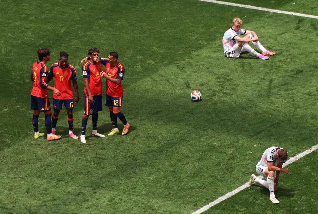 (260711) -- LOS ANGELES, July 11, 2026 (Xinhua) -- Players of both sides react after the quarter final match between Spain and Belgium at the 2026 FIFA World Cup at Los Angeles Stadium in Los Angeles, the United States, July 10, 2026. (Xinhua/Mao Siqian)