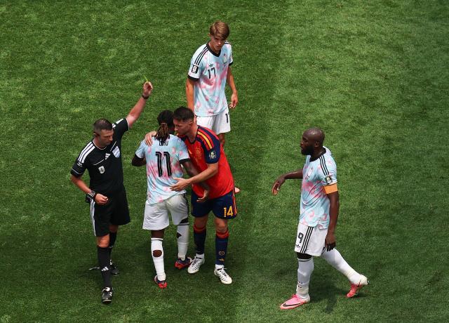 (260711) -- LOS ANGELES, July 11, 2026 (Xinhua) -- Referee Michael Oliver (1st L) shows a yellow card to Aymeric Laporte (3rd L) of Spain during the quarter final match between Spain and Belgium at the 2026 FIFA World Cup at Los Angeles Stadium in Los Angeles, the United States, July 10, 2026. (Xinhua/Mao Siqian)