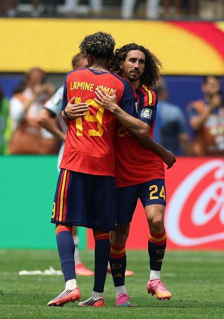 (260711) -- LOS ANGELES, July 11, 2026 (Xinhua) -- Lamine Yamal (L) and Marc Cucurella of Spain celebrate victory after the quarter final match between Spain and Belgium at the 2026 FIFA World Cup at Los Angeles Stadium in Los Angeles, the United States, July 10, 2026. (Xinhua/Bai Xuefei)