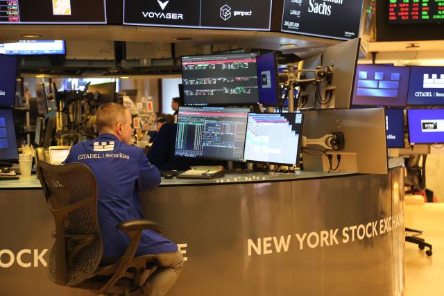 (260710) -- NEW YORK, July 10, 2026 (Xinhua) -- A trader works on the trading floor of the New York Stock Exchange in New York, the United States, on July 10, 2026. U.S. stocks ended higher on Friday. The Dow Jones Industrial Average rose 149.6 points, or 0.29 percent, to 52,637.01. The S&P 500 added 31.75 points, or 0.42 percent, to 7,575.39. The Nasdaq Composite Index increased by 74.72 points, or 0.29 percent, to 26,281.61. (Xinhua/Liu Yanan)