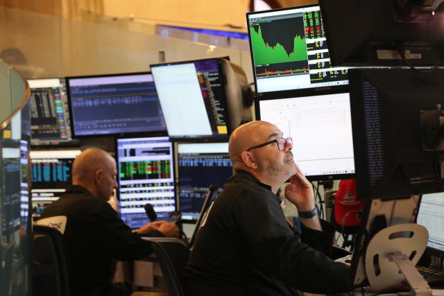 (260710) -- NEW YORK, July 10, 2026 (Xinhua) -- Traders work on the trading floor of the New York Stock Exchange in New York, the United States, on July 10, 2026. U.S. stocks ended higher on Friday. The Dow Jones Industrial Average rose 149.6 points, or 0.29 percent, to 52,637.01. The S&P 500 added 31.75 points, or 0.42 percent, to 7,575.39. The Nasdaq Composite Index increased by 74.72 points, or 0.29 percent, to 26,281.61. (Xinhua/Liu Yanan)