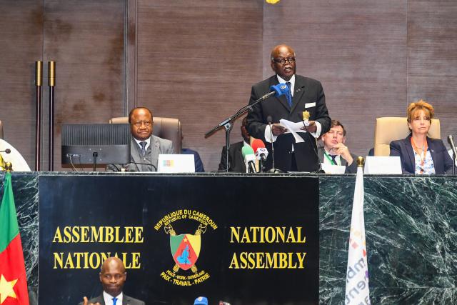 (260710) -- YAOUNDE, July 10, 2026 (Xinhua) -- Photo taken on July 10, 2026 shows Hilarion Etong (standing), President of the Parliamentary Assembly of La Francophonie, delivering a speech at the 51st plenary session of the assembly in Yaounde, Cameroon. Parliamentarians from across the French-speaking world gathered in Cameroon Friday for the 51st plenary session of the Parliamentary Assembly of La Francophonie, or APF. (Xinhua/Kepseu)
