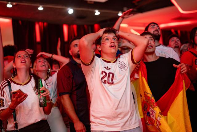 (260711) -- BARCELONA, July 11, 2026 (Xinhua) -- Spanish fans react as they watch the live broadcast of the 2026 FIFA World Cup quarterfinal match between Spain and Belgium in Barcelona, Spain, July 10, 2026. (Photo by Joan Gosa/Xinhua)