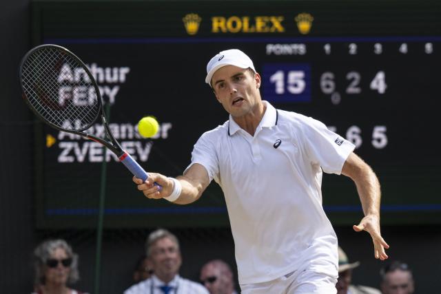 (260711) -- LONDON, July 11, 2026 (Xinhua) -- Arthur Fery hits a return during the men's singles semifinal between Arthur Fery of Britain and Alexander Zverev of Germany at the Wimbledon Tennis Championships in London, Britain, on July 10, 2026. (Photo by Stephen Chung/Xinhua)
