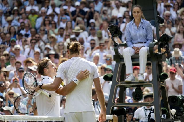 (260711) -- LONDON, July 11, 2026 (Xinhua) -- Alexander Zverev (R, front) greet Arthur Fery after the men's singles semifinal between Arthur Fery of Britain and Alexander Zverev of Germany at the Wimbledon Tennis Championships in London, Britain, on July 10, 2026. (Photo by Stephen Chung/Xinhua)