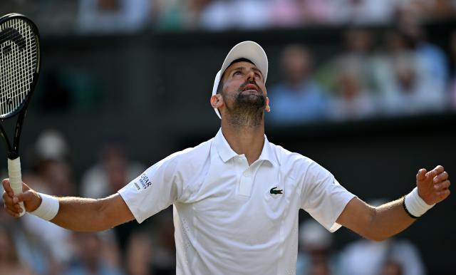 (260711) -- LONDON, July 11, 2026 (Xinhua) -- Novak Djokovic reacts during the men's singles semifinal between Jannik Sinner of Italy and Novak Djokovic of Serbia at the Wimbledon Tennis Championships in London, Britain, on July 10, 2026. (Xinhua/Li Ying)