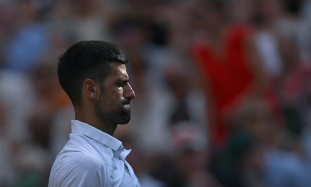 (260711) -- LONDON, July 11, 2026 (Xinhua) -- Novak Djokovic reacts during the men's singles semifinal between Jannik Sinner of Italy and Novak Djokovic of Serbia at the Wimbledon Tennis Championships in London, Britain, on July 10, 2026. (Xinhua/Li Ying)
