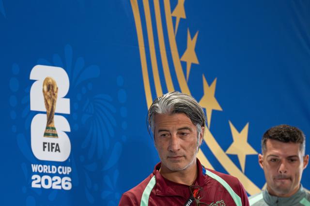 (260711) -- KANSAS CITY, July 11, 2026 (Xinhua) -- Murat Yakin (L), head coach of Switzerland, attends a press conference ahead of the quarterfinal between Argentina and Switzerland at the 2026 FIFA World Cup in Kansas City, the United States, on July 10, 2026. (Xinhua/Xiao Yijiu)
