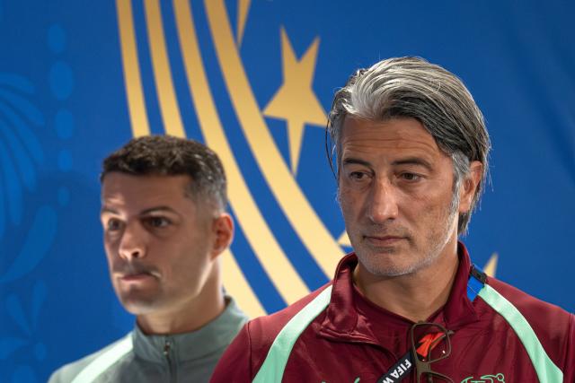 (260711) -- KANSAS CITY, July 11, 2026 (Xinhua) -- Murat Yakin (R), head coach of Switzerland, attends a press conference ahead of the quarterfinal between Argentina and Switzerland at the 2026 FIFA World Cup in Kansas City, the United States, on July 10, 2026. (Xinhua/Xiao Yijiu)