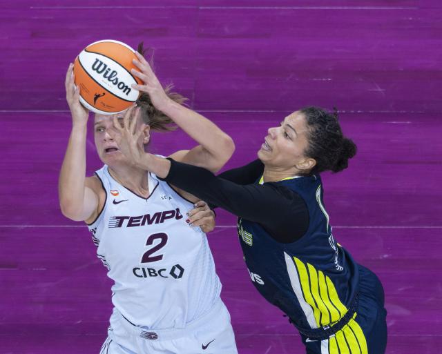 (260711) -- MONTREAL, July 11, 2026 (Xinhua) -- Laura Juskaite (L) of Toronto Tempo vies with Alysha Clark of Dallas Wings during the 2026 WNBA regular season basketball game between Toronto Tempo and Dallas Wings in Montreal, Canada, on July 10, 2026. (Photo by Zou Zheng/Xinhua)