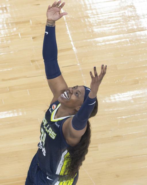 (260711) -- MONTREAL, July 11, 2026 (Xinhua) -- Arike Ogunbowale of Dallas Wings celebrates scoring during the 2026 WNBA regular season basketball game between Toronto Tempo and Dallas Wings in Montreal, Canada, on July 10, 2026. (Photo by Zou Zheng/Xinhua)