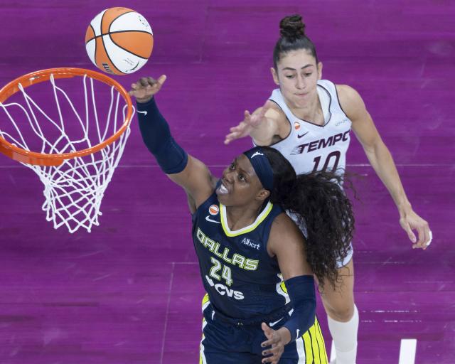 (260711) -- MONTREAL, July 11, 2026 (Xinhua) -- Arike Ogunbowale (front) of Dallas Wings goes up for a layup during the 2026 WNBA regular season basketball game between Toronto Tempo and Dallas Wings in Montreal, Canada, on July 10, 2026. (Photo by Zou Zheng/Xinhua)