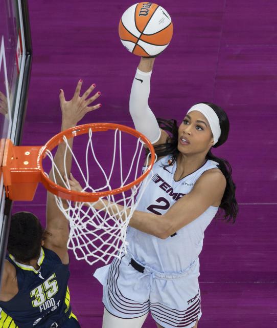 (260711) -- MONTREAL, July 11, 2026 (Xinhua) -- Isabelle Harrison (R) of Toronto Tempo goes up for a layup during the 2026 WNBA regular season basketball game between Toronto Tempo and Dallas Wings in Montreal, Canada, on July 10, 2026. (Photo by Zou Zheng/Xinhua)