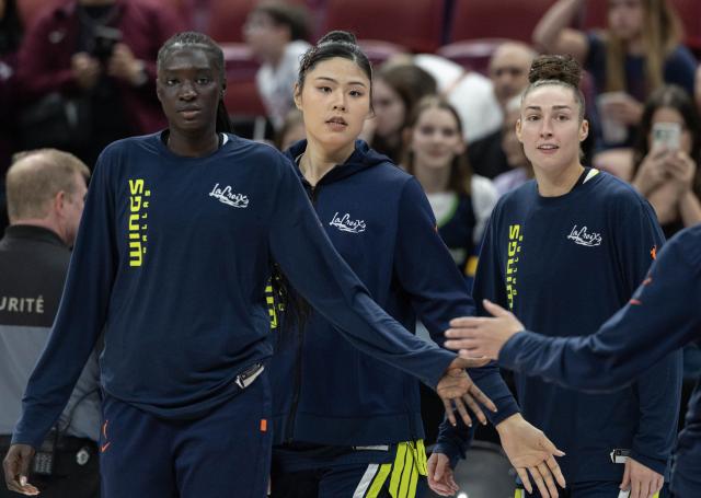 (260711) -- MONTREAL, July 11, 2026 (Xinhua) -- Li Yueru (2nd L) of Dallas Wings warms up before the 2026 WNBA regular season basketball game between Toronto Tempo and Dallas Wings in Montreal, Canada, on July 10, 2026. (Photo by Zou Zheng/Xinhua)