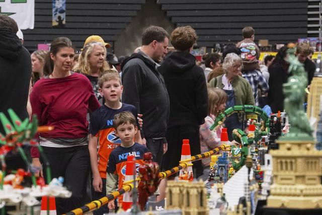 (260711) -- CHRISTCHURCH, July 11, 2026 (Xinhua) -- People view creations by LEGO enthusiasts displayed during the Christchurch Brick Show 2026 in Christchurch, New Zealand, July 11, 2026. The two-day event kicked off here on Saturday, attracting LEGO fans with its aesthetically pleasing and creatively designed exhibits. Held annually in July, this exhibition is the largest LEGO brick event in New Zealand. (Photo by Chen Siyumeng/Xinhua)