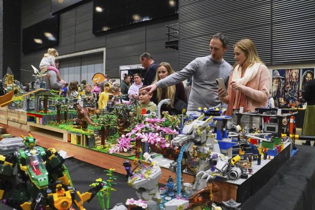 (260711) -- CHRISTCHURCH, July 11, 2026 (Xinhua) -- People view creations by LEGO enthusiasts displayed during the Christchurch Brick Show 2026 in Christchurch, New Zealand, July 11, 2026. The two-day event kicked off here on Saturday, attracting LEGO fans with its aesthetically pleasing and creatively designed exhibits. Held annually in July, this exhibition is the largest LEGO brick event in New Zealand. (Photo by Chen Siyumeng/Xinhua)