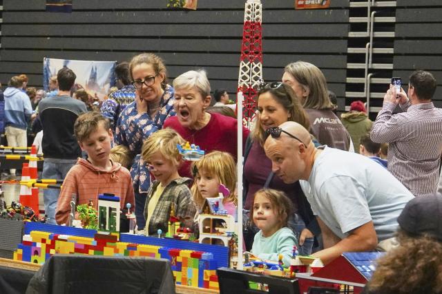 (260711) -- CHRISTCHURCH, July 11, 2026 (Xinhua) -- People view creations by LEGO enthusiasts displayed during the Christchurch Brick Show 2026 in Christchurch, New Zealand, July 11, 2026. The two-day event kicked off here on Saturday, attracting LEGO fans with its aesthetically pleasing and creatively designed exhibits. Held annually in July, this exhibition is the largest LEGO brick event in New Zealand. (Photo by Chen Siyumeng/Xinhua)