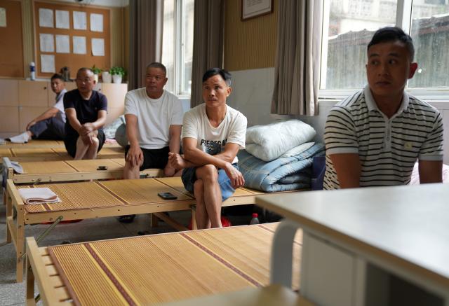 (260711) -- BEIJING, July 11, 2026 (Xinhua) -- Workers evacuated from a construction site watch television news on the incoming typhoon at a temporary shelter in Shankou Town of Qingtian County, east China's Zhejiang Province, July 11, 2026.
  Zhejiang Province in east China raised its typhoon emergency response to the highest level on Saturday as Typhoon Bavi, the 9th typhoon of 2026, barrels toward the country's eastern coast, triggering widespread disaster prevention efforts across multiple provincial-level regions. Several other nearby provincial-level regions have also rolled out targeted response measures against the approaching typhoon.
   According to Zhejiang Meteorological Observatory, the severe typhoon was located some 489 km off the coast of the province's city of Wenzhou as of 9 a.m. on Saturday, packing strong-typhoon-level winds near its center. It is forecast to move northwest at a speed of 30 to 35 km per hour and make landfall in Zhejiang around midnight. (Xinhua/Han Chuanhao)