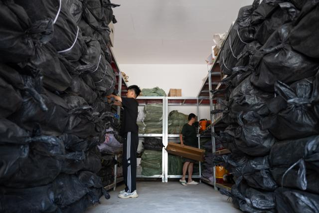 (260711) -- BEIJING, July 11, 2026 (Xinhua) -- Staff members arrange flood-control supplies at the Tiantang Reservoir management office in Luotian County of Huanggang City, central China's Hubei Province, on July 11, 2026. Chinese authorities on Saturday intensified emergency response measures with Typhoon Bavi set to slam into the country's eastern coast, resulting in meteorological, water resources, transport and emergency management authorities issuing alerts and reinforcing flood-control efforts ahead of the expected landfall.
   The country's State Flood Control and Drought Relief Headquarters activated a Level-IV emergency response for flood and typhoon control in Shanghai, Jiangsu, Anhui and Jiangxi, all in east China, as well as southwest China's Sichuan Province, according to the Ministry of Emergency Management. (Xinhua/Wu Zhizun)