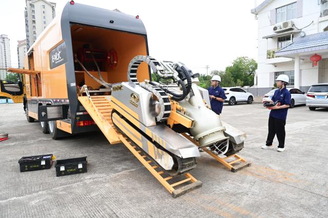 (260711) -- BEIJING, July 11, 2026 (Xinhua) -- Technicians test an emergency water supply and drainage rescue vehicle in Nanping City, southeast China's Fujian Province, on July 11, 2026. Chinese authorities on Saturday intensified emergency response measures with Typhoon Bavi set to slam into the country's eastern coast, resulting in meteorological, water resources, transport and emergency management authorities issuing alerts and reinforcing flood-control efforts ahead of the expected landfall.
   The country's State Flood Control and Drought Relief Headquarters activated a Level-IV emergency response for flood and typhoon control in Shanghai, Jiangsu, Anhui and Jiangxi, all in east China, as well as southwest China's Sichuan Province, according to the Ministry of Emergency Management. (Xinhua/Lin Shanchuan)
