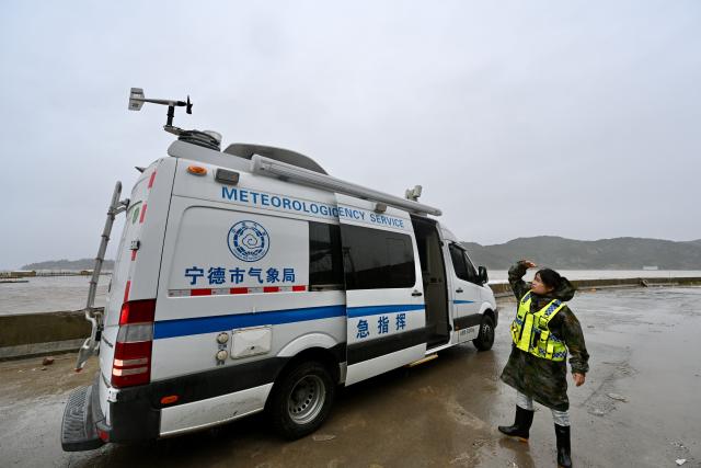 (260711) -- BEIJING, July 11, 2026 (Xinhua) -- A meteorological emergency command vehicle collects meteorological data by the sea in Fuding City, southeast China's Fujian Province, on July 11, 2026. Chinese authorities on Saturday intensified emergency response measures with Typhoon Bavi set to slam into the country's eastern coast, resulting in meteorological, water resources, transport and emergency management authorities issuing alerts and reinforcing flood-control efforts ahead of the expected landfall.
   The country's State Flood Control and Drought Relief Headquarters activated a Level-IV emergency response for flood and typhoon control in Shanghai, Jiangsu, Anhui and Jiangxi, all in east China, as well as southwest China's Sichuan Province, according to the Ministry of Emergency Management. (Xinhua/Jiang Kehong)