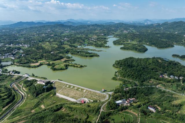 (260711) -- BEIJING, July 11, 2026 (Xinhua) -- An aerial drone photo taken on July 11, 2026 shows the Baiyanghe Reservoir in Xishui County of Huanggang City, central China's Hubei Province. Chinese authorities on Saturday intensified emergency response measures with Typhoon Bavi set to slam into the country's eastern coast, resulting in meteorological, water resources, transport and emergency management authorities issuing alerts and reinforcing flood-control efforts ahead of the expected landfall.
   The country's State Flood Control and Drought Relief Headquarters activated a Level-IV emergency response for flood and typhoon control in Shanghai, Jiangsu, Anhui and Jiangxi, all in east China, as well as southwest China's Sichuan Province, according to the Ministry of Emergency Management. (Xinhua/Wu Zhizun)