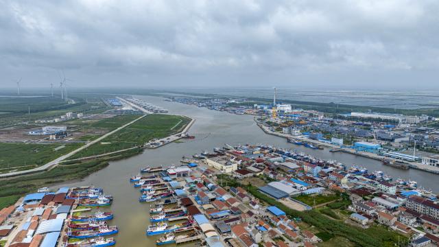 (260711) -- BEIJING, July 11, 2026 (Xinhua) -- An aerial drone photo taken on July 11, 2026 shows fishing boats taking shelter from the typhoon at a port in Yancheng, east China's Jiangsu Province. Chinese authorities on Saturday intensified emergency response measures with Typhoon Bavi set to slam into the country's eastern coast, resulting in meteorological, water resources, transport and emergency management authorities issuing alerts and reinforcing flood-control efforts ahead of the expected landfall.
   The country's State Flood Control and Drought Relief Headquarters activated a Level-IV emergency response for flood and typhoon control in Shanghai, Jiangsu, Anhui and Jiangxi, all in east China, as well as southwest China's Sichuan Province, according to the Ministry of Emergency Management. (Photo by Peng Ling/Xinhua)