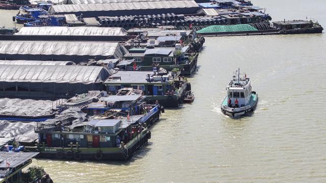 (260711) -- BEIJING, July 11, 2026 (Xinhua) -- A drone photo taken on July 11, 2026 shows staff members patrolling on a boat in prevention of Typhoon Bavi in Huai'an, east China's Jiangsu Province. Chinese authorities on Saturday intensified emergency response measures with Typhoon Bavi set to slam into the country's eastern coast, resulting in meteorological, water resources, transport and emergency management authorities issuing alerts and reinforcing flood-control efforts ahead of the expected landfall.
   The country's State Flood Control and Drought Relief Headquarters activated a Level-IV emergency response for flood and typhoon control in Shanghai, Jiangsu, Anhui and Jiangxi, all in east China, as well as southwest China's Sichuan Province, according to the Ministry of Emergency Management. (Photo by Zhao Qirui/Xinhua)