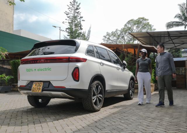 (260713) -- KENYA, July 13, 2026 (Xinhua) -- People walk past a China-made electric vehicle at an auto dealership in Nairobi, capital of Kenya, July 12, 2026.
  TO GO WITH XINHUA HEADLINES ON JULY 13, 2026. (Xinhua/Yang Guang)