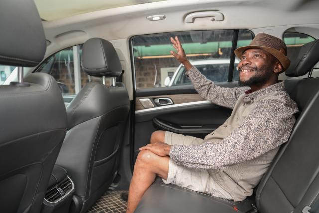 (260713) -- KENYA, July 13, 2026 (Xinhua) -- A customer sits in a China-made electric vehicle at an auto dealership in Nairobi, capital of Kenya, July 12, 2026.
  TO GO WITH XINHUA HEADLINES ON JULY 13, 2026. (Xinhua/Yang Guang)