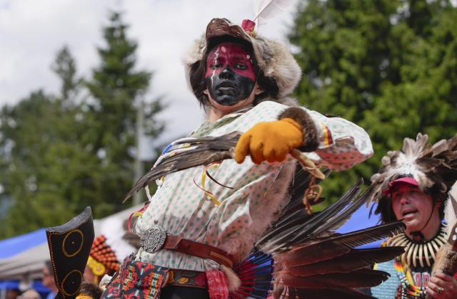 (260713) -- NORTH VANCOUVER, July 13, 2026 (Xinhua) -- A member of Indigenous community performs during the Squamish Nation Youth Pow-Wow in North Vancouver, British Columbia, Canada, on July 12, 2026. The annual event brought together Indigenous youth, dancers, drummers and community members to celebrate First Nations cultures, traditions and heritage through traditional songs, dances and ceremonies. (Photo by Liang Sen/ Xinhua)