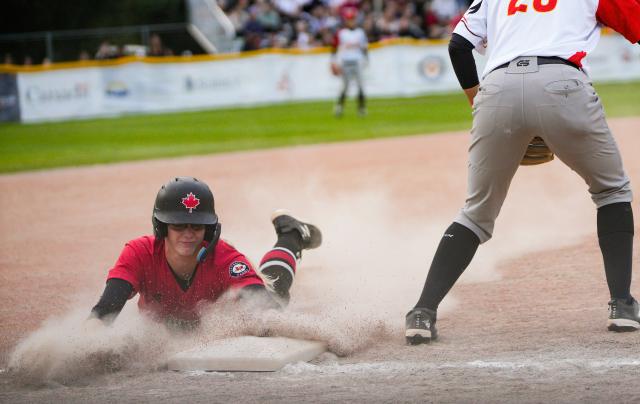 (260713) -- SURREY, July 13, 2026 (Xinhua) -- Kianna Jones (L) of Canada competes during the final game between China and Canada at the 2026 Canada Cup International Softball Championship in Surrey, British Columbia, Canada, July 12, 2026.
Canada claimed the championship title with a 7-3 victory over China, while China finished as the first runner-up. (Photo by Liang Sen/Xinhua)