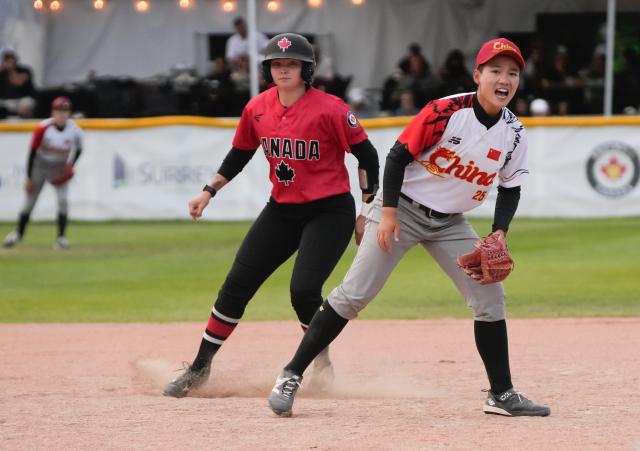 (260713) -- SURREY, July 13, 2026 (Xinhua) -- Yan Siyu (R) of China competes during the final game between China and Canada at the 2026 Canada Cup International Softball Championship in Surrey, British Columbia, Canada, July 12, 2026.
Canada claimed the championship title with a 7-3 victory over China, while China finished as the first runner-up. (Photo by Liang Sen/Xinhua)