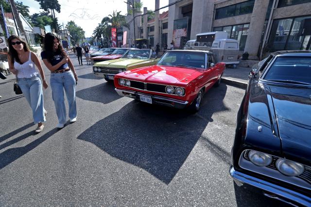(260713) -- ALEY, July 13, 2026 (Xinhua) -- People visit the classic cars exhibition in Aley, Lebanon, July 12, 2026. (Xinhua/Bilal Jawich)