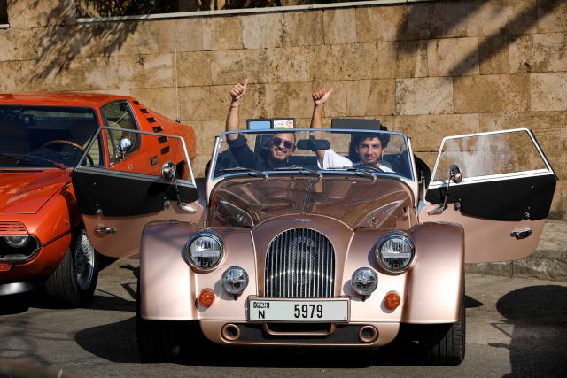 (260713) -- ALEY, July 13, 2026 (Xinhua) -- People visit the classic cars exhibition in Aley, Lebanon, July 12, 2026. (Xinhua/Bilal Jawich)