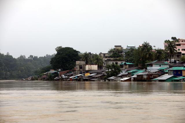 (260713) -- COX'S BAZAR, July 13, 2026 (Xinhua) -- This photo taken on July 12, 2026 shows a flood-affected area in Cox's Bazar district, Bangladesh. Floods that have swept parts of Bangladesh for about a week have killed 51 people, said a senior official on Sunday.
   According to the latest daily disaster situation report released by the country's Ministry of Disaster Management and Relief, more than 1.02 million people were marooned by floods in seven out of the country's total 64 districts. (Photo by Habibur Rahman/Xinhua)