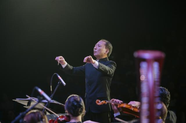 (260713) -- DA NANG, July 13, 2026 (Xinhua) -- A conductor performs during a China-Vietnam concert in Da Nang, Vietnam, July 10, 2026. TO GO WITH "Asia-Pacific Community: China-Vietnam concert echoes enduring cultural ties, people-to-people exchanges" (China Cultural Center in Hanoi/Handout via Xinhua)